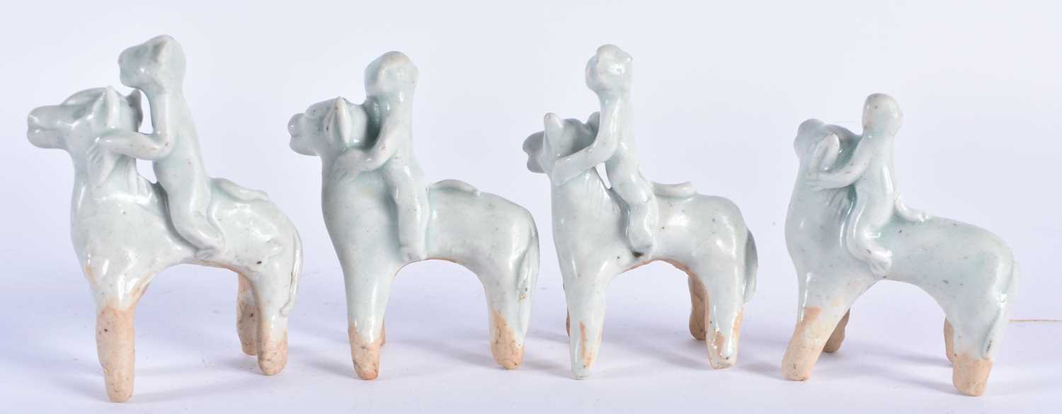 A SET OF FOUR CHINESE QING DYNASTY QINGBAI STONEWARE ANIMALS together with four similar censers. - Image 6 of 7