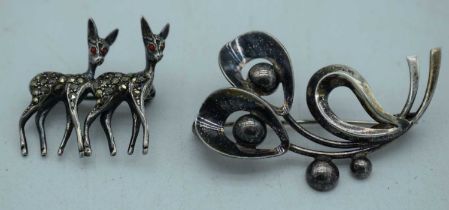 TWO SILVER BROOCHES. 11 grams. Largest 4 cm x 2.75 cm. (2)