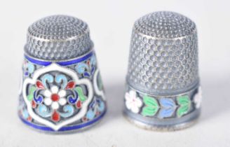 Two Continental Silver and Enamel Thimbles. 2.2 cm x 1.7cm, total weight 21g (2)