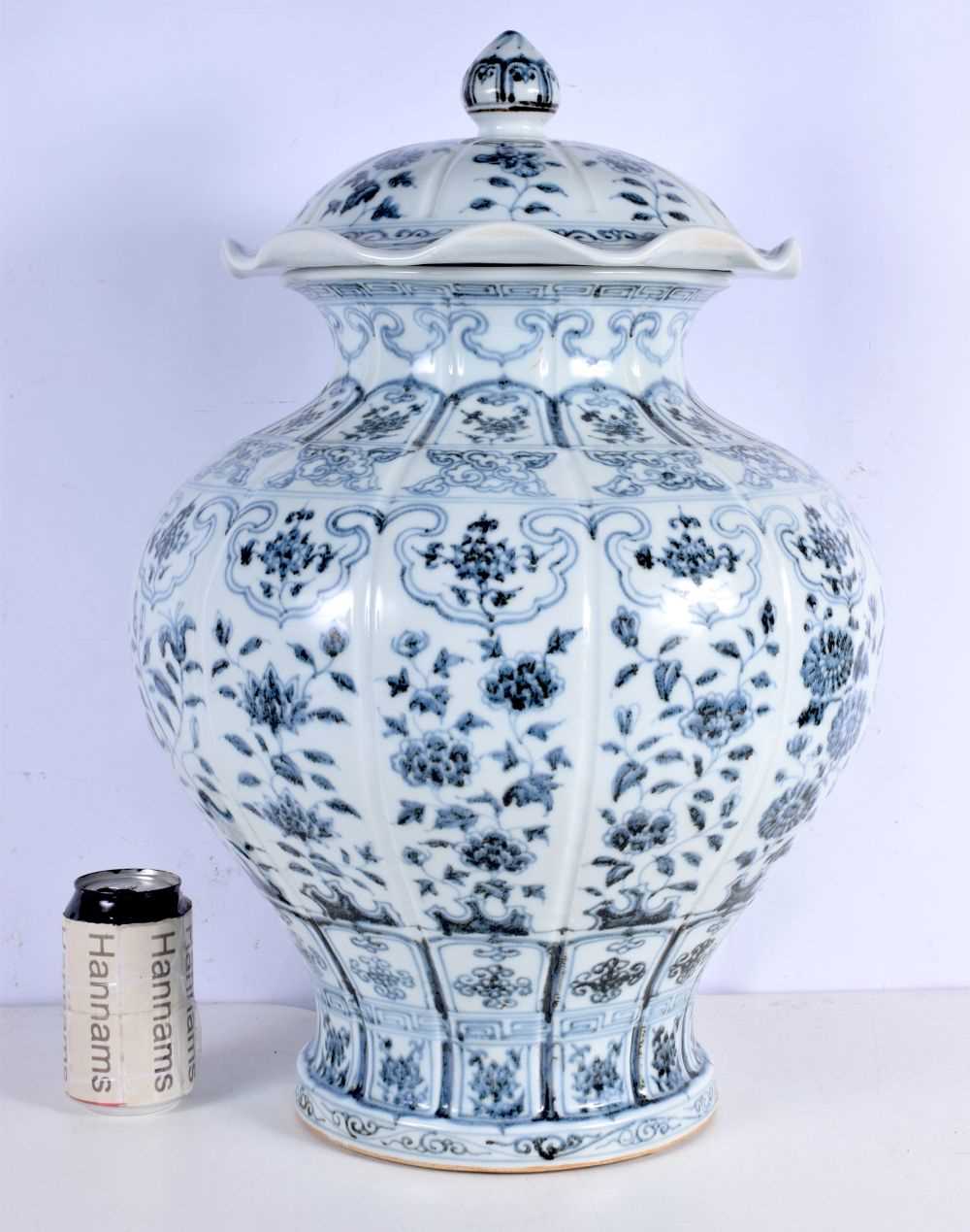 A large Chinese Porcelain blue and white Jar with cover decorative with a floral pattern 55 cm - Image 2 of 6