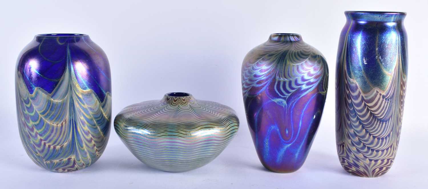 FOUR IRIDESCENT ART GLASS VASES. Largest 22 cm high. (4)