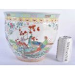 A CHINESE REPUBLICAN PERIOD FAMILLE ROSE PORCELAIN JARDINIERE painted with birds and foliage. 22