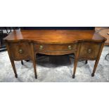 A 19th Century mahogany and Walnut Burr Serpentine Sideboard with one cupboard and two drawers , inl