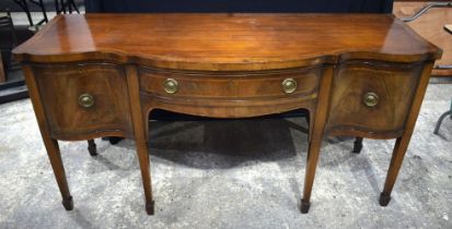A 19th Century mahogany and Walnut Burr Serpentine Sideboard with one cupboard and two drawers , inl
