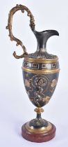 A 19TH CENTURY FRENCH GRAND TOUR BRONZE CLASSICAL EWER overlaid with serpents. 24 cm high.