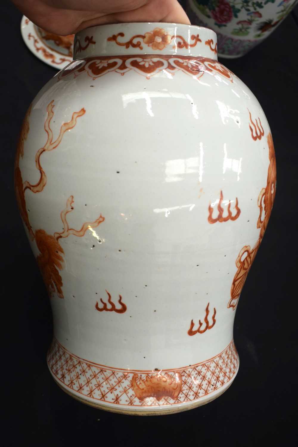 A LARGE PAIR OF CHINESE QING DYNASTY IRON RED PAINTED GINGER JARS AND COVERS painted with buddhistic - Image 5 of 26