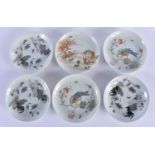 SIX CHINESE QING DYNASTY PORCELAIN SAUCERS of varying designs. 11cm diameter. (6)