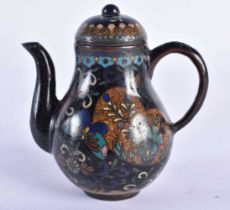 A 19TH CENTURY JAPANESE MEIJI PERIOD CLOISONNE ENAMEL TEAPOT AND COVER decorated with foliage. 9