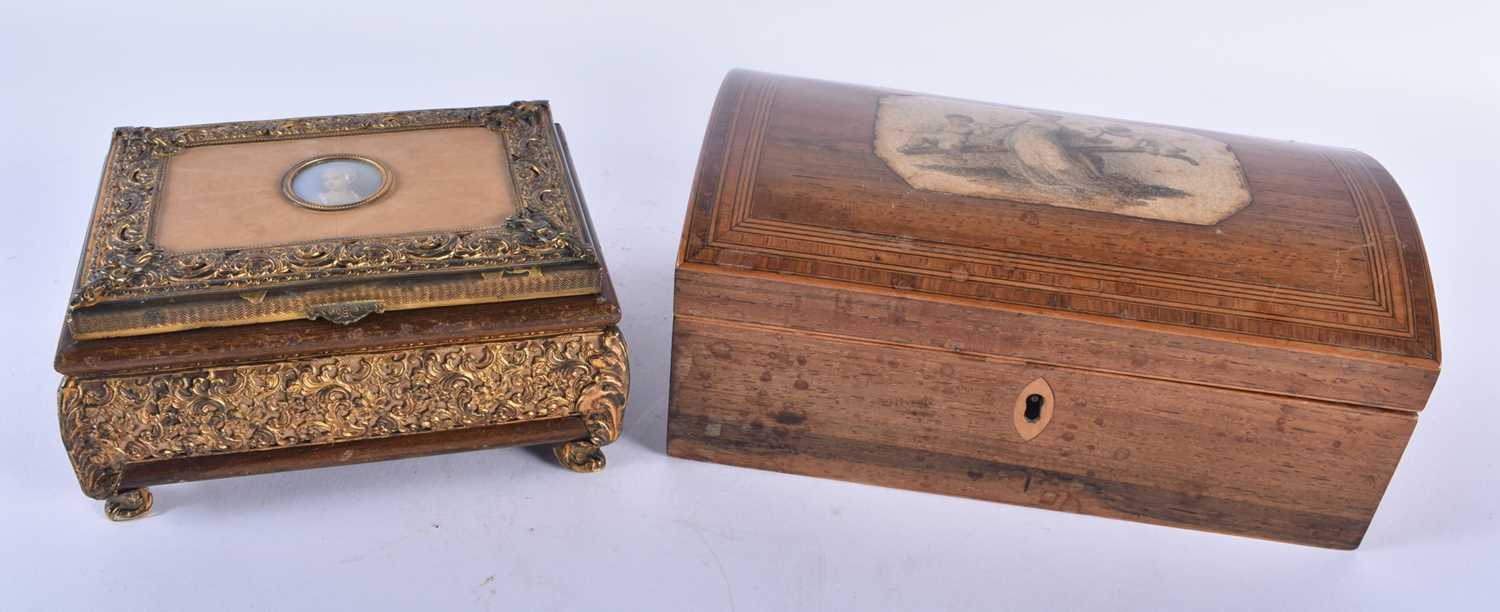 A LARGE EARLY VICTORIAN MAHOGANY DOME TOP BOX together with a French gilt metal repousse casket,