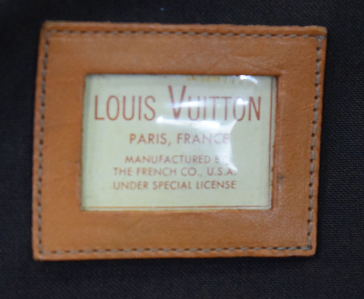 A Louis Vuitton Holdall 32 x 60 x 27 cm - Image 11 of 12