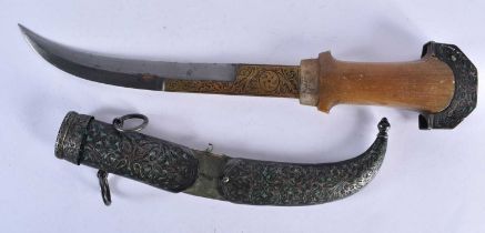 A LARGE 19TH CENTURY ISLAMIC MIDDLE EASTERN RHINOCEROS HORN SILVER AND ENAMEL DAGGER with gilt