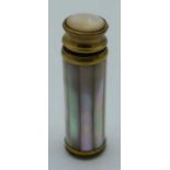 AN ANTIQUE MOTHER OF PEARL SPRINGING SCENT BOTTLE. 48 grams. 10 cm x 2 cm extended.