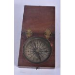 A Compass in a Wood Case. 6.4cm x 6.5 cm z 1.8 cm. Working