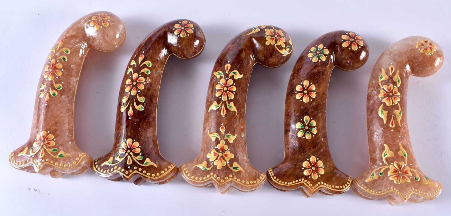 A SET OF FIVE MIDDLE EASTERN QAJAR LACQUER HARDSTONE DAGGER HANDLES overlaid with foliage and vines. - Image 5 of 6