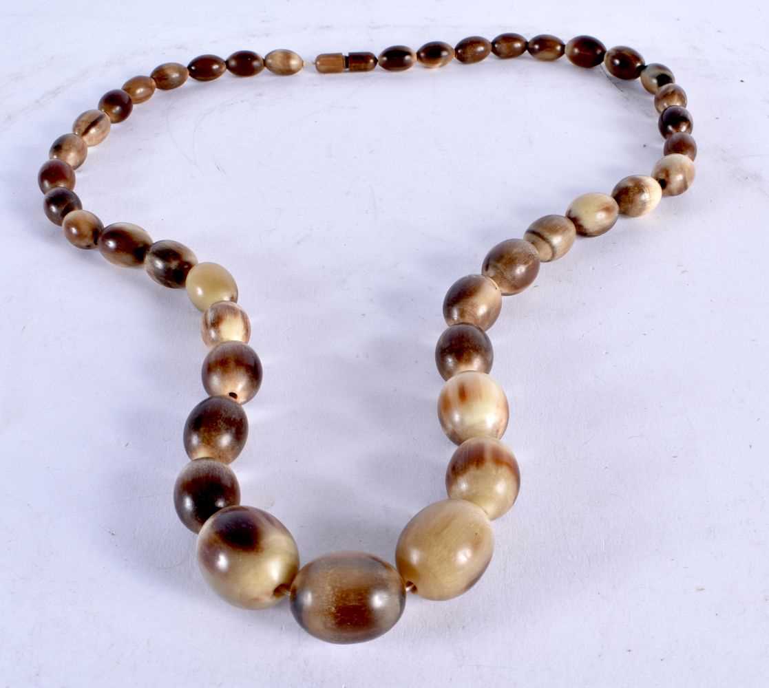 A Carved Horn Bead Necklace. 80cm long. Largest Bead 20mm, weight 106g - Image 2 of 8