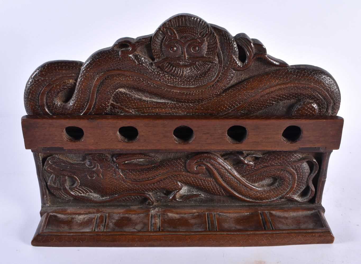 AN EARLY 20TH CENTURY ANGLO INDIAN KASHMIRI CARVED HARDWOOD PIPE STAND CECORATED WITH DRAGONS 22 - Image 2 of 4