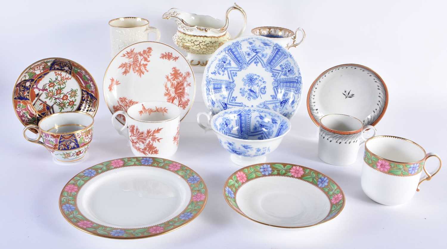 A COLLECTION OF 19TH CENTURY ENGLISH PORCELAIN CUPS AND SAUCERS in various forms and sizes.