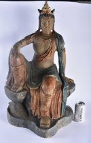 A LARGE EARLY 20TH CENTURY CHINESE CARVED WOOD PAINTED FIGURE OF A BUDDHA modelled seated upon a