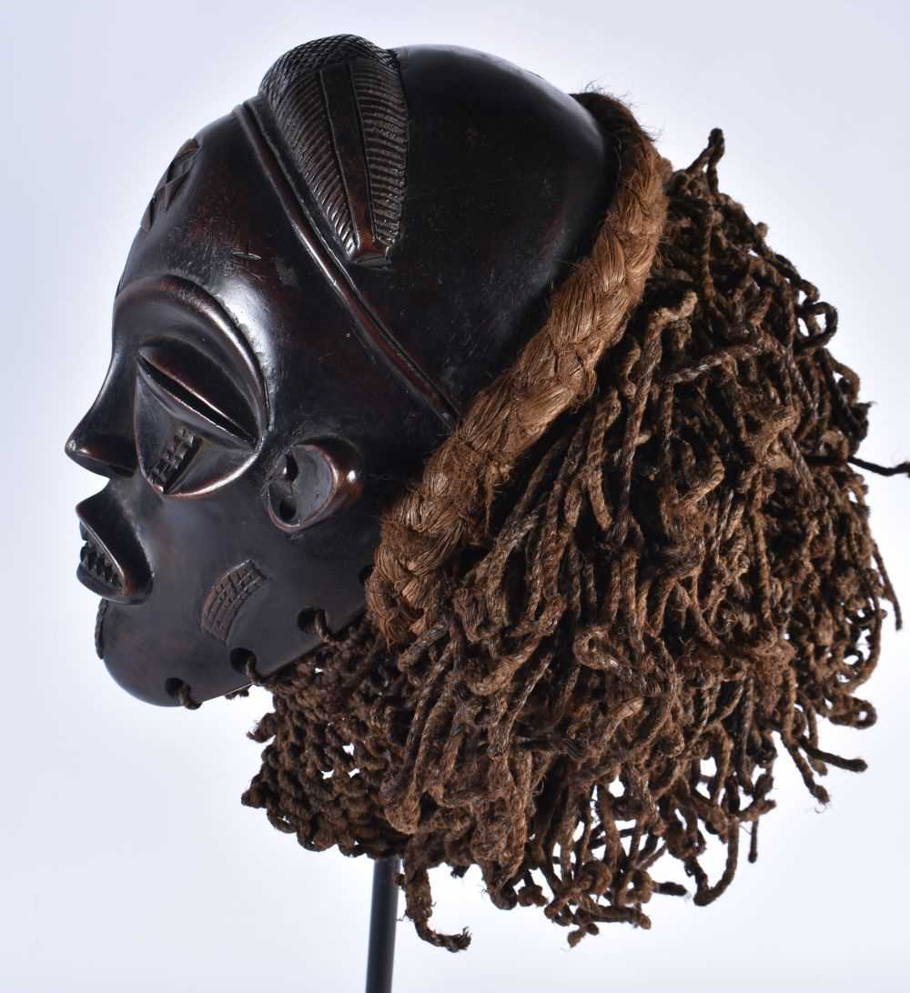 A LARGE EARLY 20TH CENTURY AFRICAN TRIBAL WOOD MASK with later stand. 58 cm x 14 cm. - Image 4 of 8