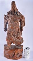 A LARGE CHINESE CARVED HARDWOOD FIGURE OF A STANDING WARRIOR 20th Century. 56 cm x 15 cm.