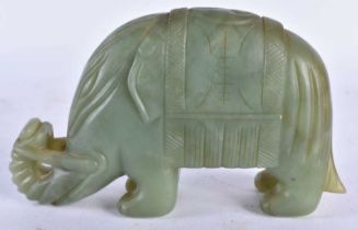 A LATE 19TH CENTURY CHINESE CARVED JADE FIGURE OF AN ELEPHANT Qing. 9 cm x 12 cm.