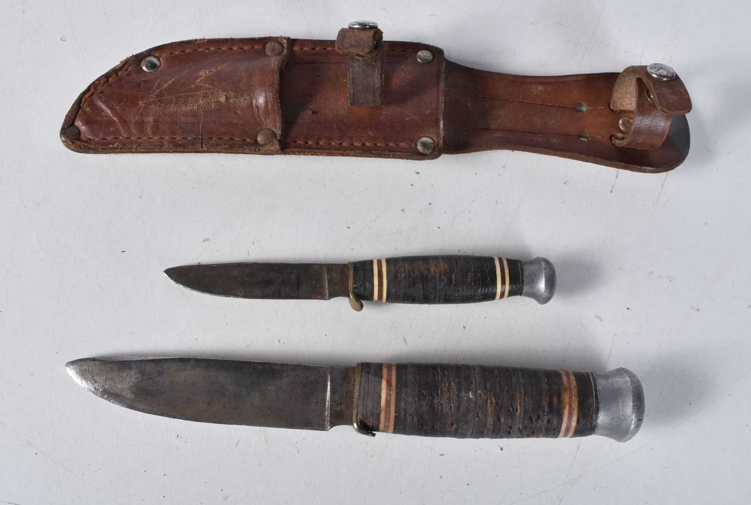 A large Indian Kukri with leather sheath together with a large South American knife with a carved - Image 7 of 12