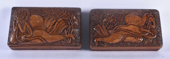 A PAIR OF 19TH CENTURY ANGLO INDIAN BURMESE ASIAN CARVED WOOD CASKETS decorated in relief with