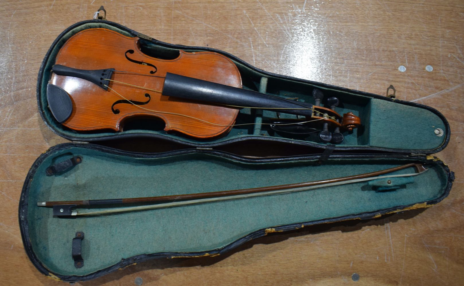 A Cased violin 60 cm.