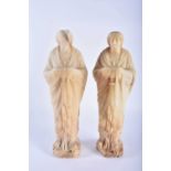 A LARGE PAIR OF 19TH CENTURY EUROPEAN CARVED ALABASTER FIGURES OF SAINTS modelled in flowing