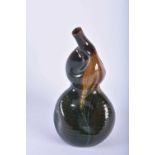 A VERY RARE LINTHORPE ART POTTERY JAPANESE STYLE SAKI BOTTLE designed by Dr Christopher Dresser.