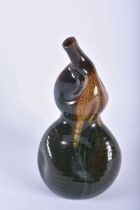 A VERY RARE LINTHORPE ART POTTERY JAPANESE STYLE SAKI BOTTLE designed by Dr Christopher Dresser.