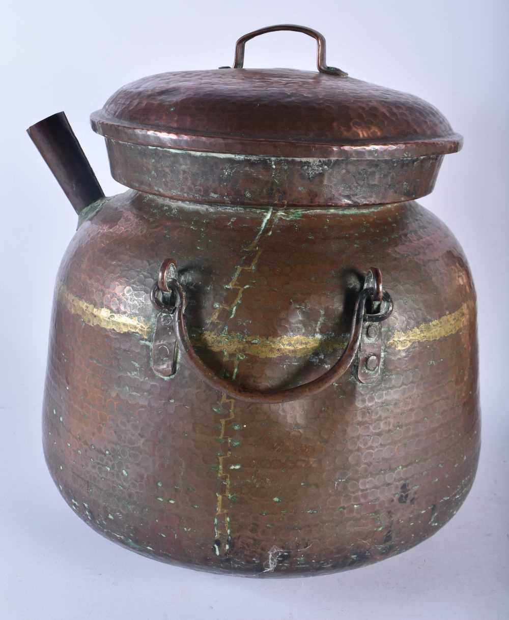 A LARGE EARLY 20TH CENTURY MALAYSIAN HAMMERED COPPER COOKING POT together with other dishes & a - Image 4 of 7