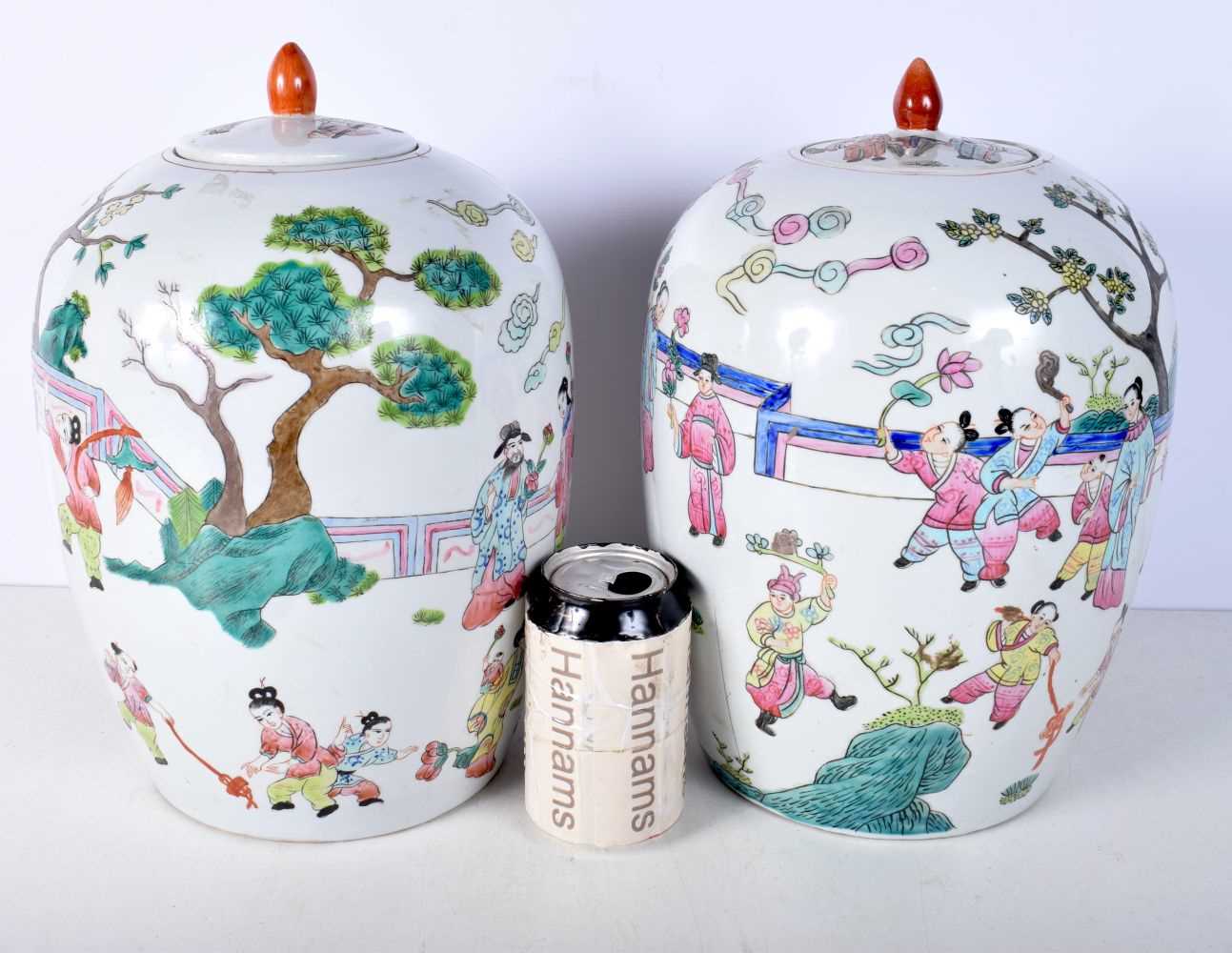 A pair of Chinese porcelain polychrome lidded jars decorated with figures 30cm (2). - Image 2 of 6