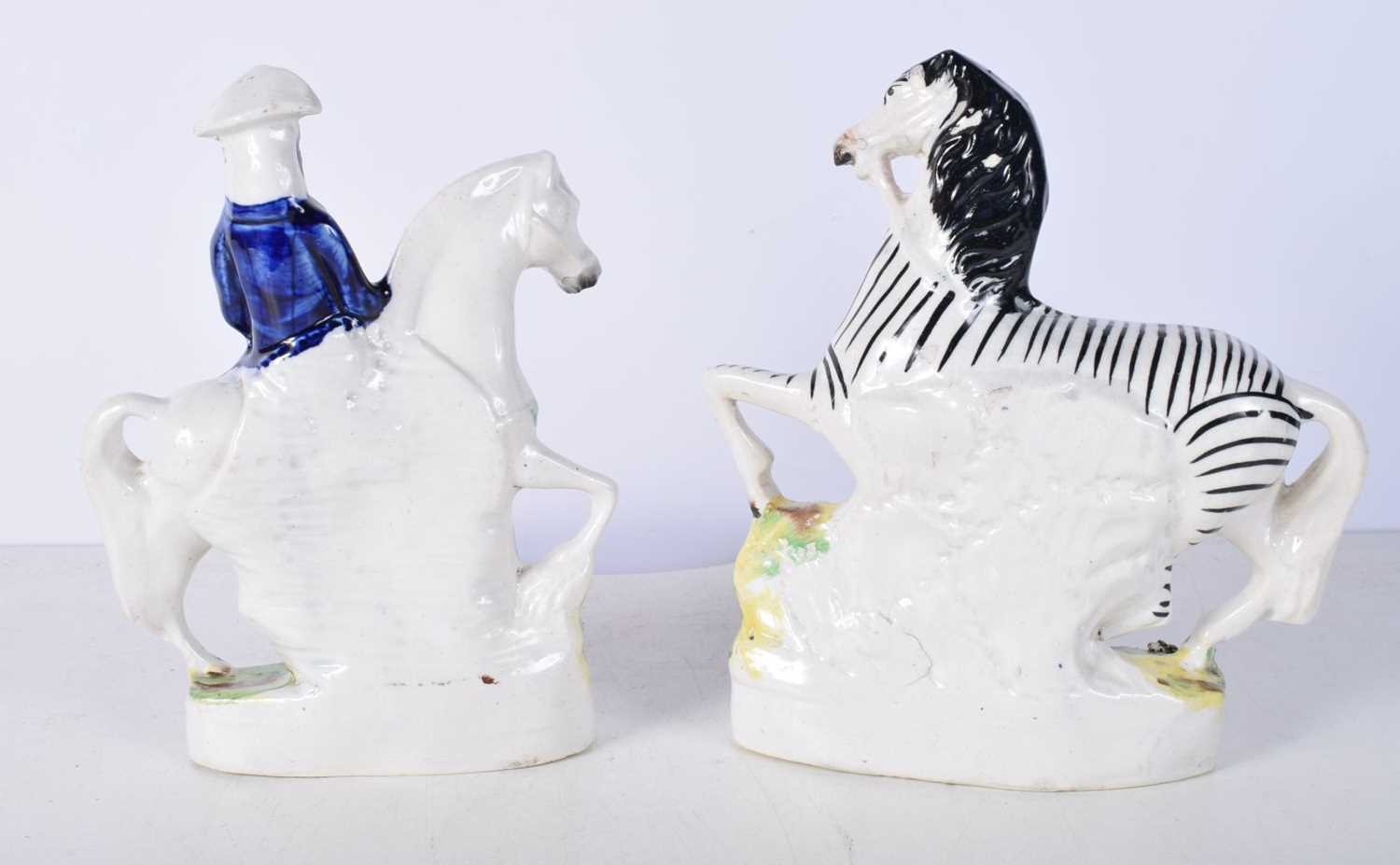 A 19th Century Staffordshire flatback figure of a Zebra together with a Tom King figure 23 cm (2). - Image 5 of 8