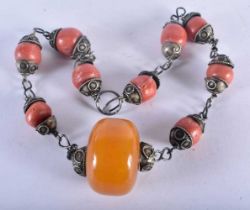A Beaded Necklace. Largest Bead 3.4cm, length 42cm, weight 85.84g