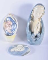 AN AUSTRIAN VIENNA PORCELAIN MADONNA AND CHILD FONT together with a similar English porcelain plaque