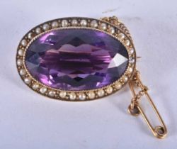 AN ANTIQUE YELLOW METAL AMETHYST AND PEARL BROOCH. 7 grams. 2.75 cm x 2 cm.