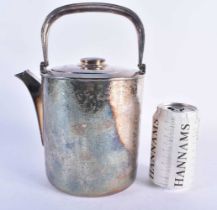 A LARGE EARLY 20TH CENTURY JAPANESE MEIJI PERIOD SILVER TEA KETTLE decorated with a seaweed like