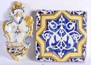 AN 18TH CENTURY ITALIAN FRENCH FAIENCE POTTERY FONT together with an early Spanish faience tile.