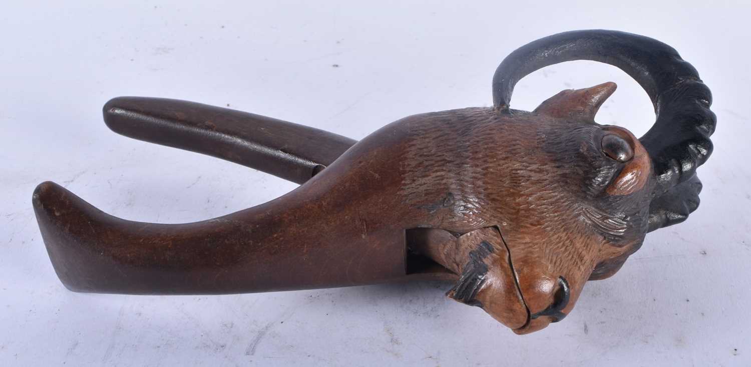 A PAIR OF 19TH CENTURY BAVARIAN BLACK FOREST CARVED WOOD IBEX NUT CRACKERS. 19 cm high. - Image 2 of 3