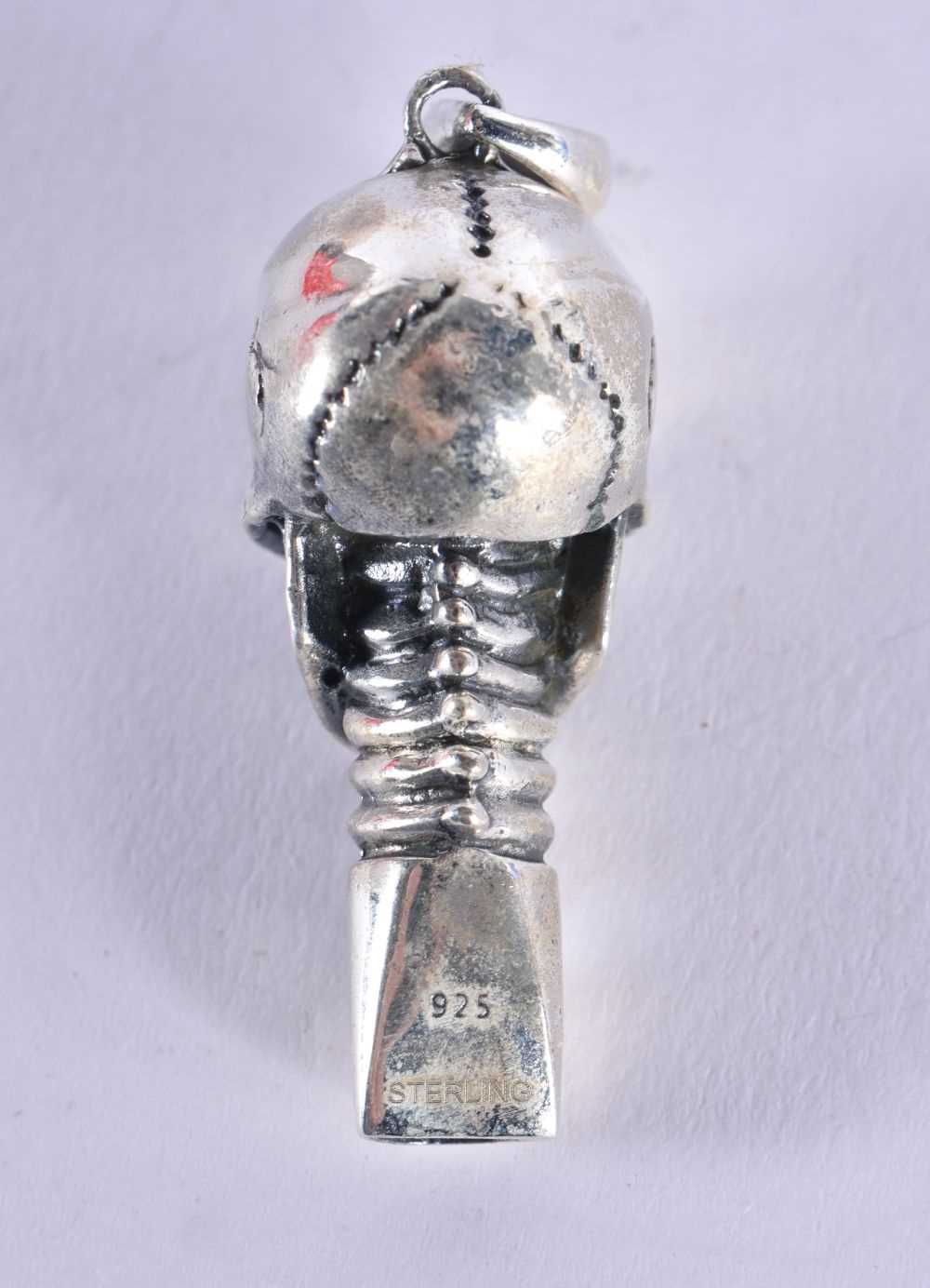 A Silver Skull Whistle Pendant. Stamped 925 Sterling, 4.9cm x 1.6 cm x 1.8 cm, weight 16.4g - Image 2 of 3