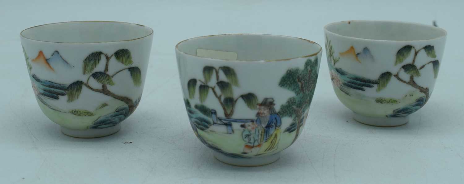 Three Chinese porcelain tea bowls decorated with figures in a landscape 6 x 7 cm (3) - Image 3 of 6