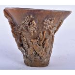 A CHINESE CARVED BUFFALO HORN TYPE LIBATION CUP 20th Century. 613 grams. 13 cm x 13 cm.