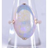 A 14 Carat and White Opal Ring. Size N, Stamped 14CT, Opal 18.9mm x 12.9mm x 5.9mm