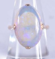 A 14 Carat and White Opal Ring. Size N, Stamped 14CT, Opal 18.9mm x 12.9mm x 5.9mm
