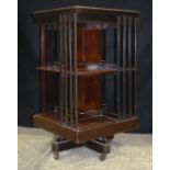 An antique revolving mahogany book stand 84 x 47 x 47 cm