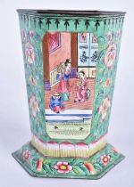 A 19TH CENTURY CHINESE CANTON ENAMEL HEXAGONAL VASE Qing, painted with figures and flowers. 11.5