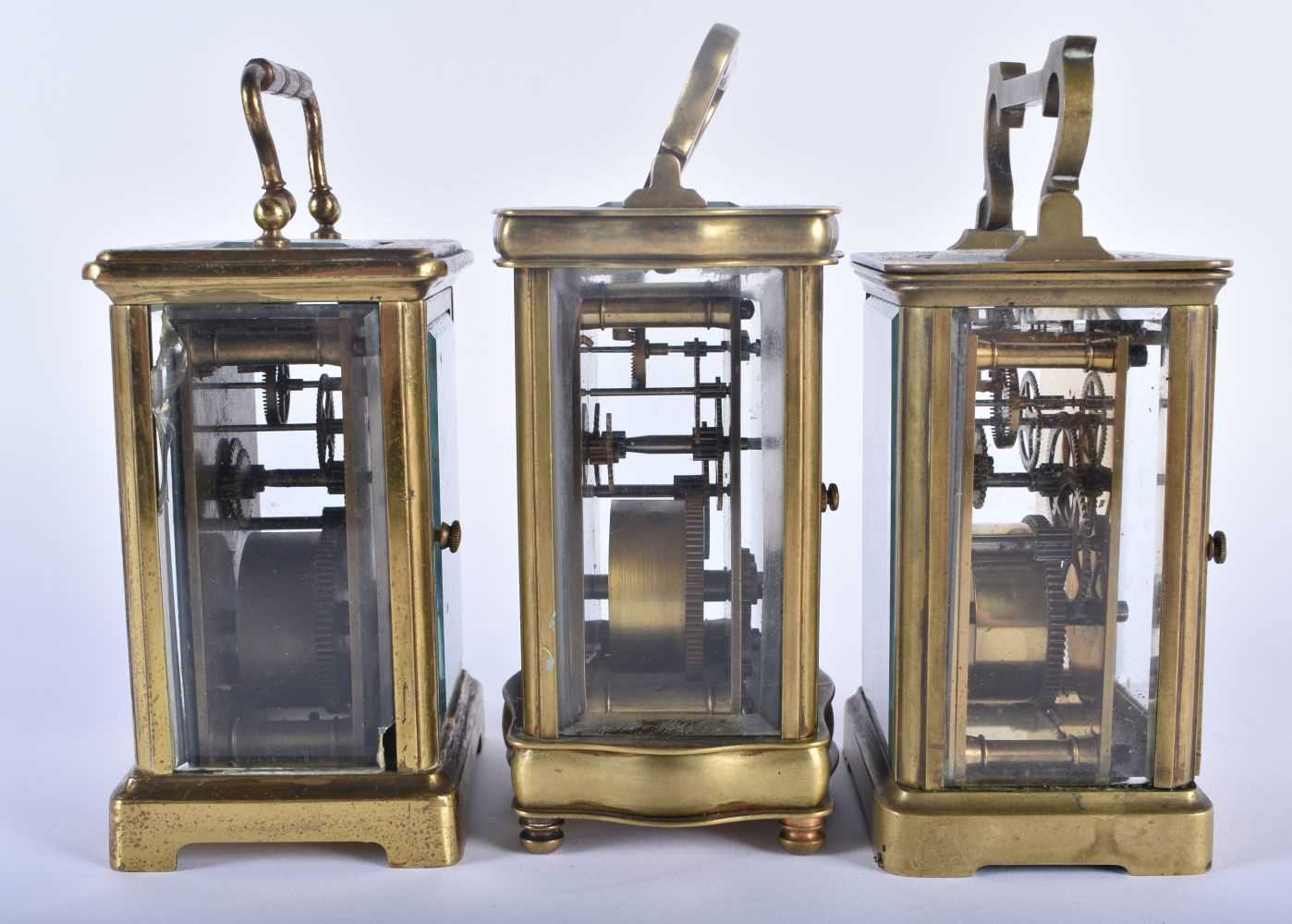 THREE ANTIQUE FRENCH BRASS CARRIAGE CLOCKS 14.25cm high inc handle. (3) - Image 2 of 6