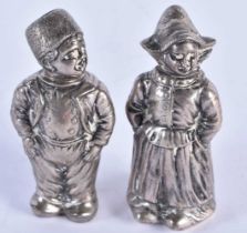 A PAIR OF ANTIQUE DUTCH SILVER FIGURAL CONDIMENTS. 124 grams. 8 cm x 3.5 cm.