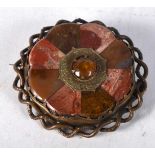 A Victorian Scottish Agate Brooch set with a centre gemstone. 5.6 cm diameter, weight 27.1g
